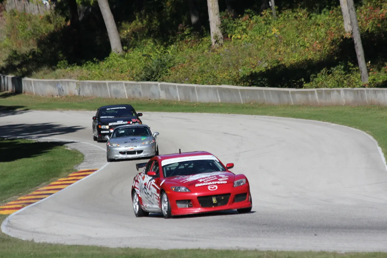 The Top 3 cars in the STL (Super Touring Lite) class during the 2013 SCCA National Championship runoffs. This file was uploaded with Commonist .