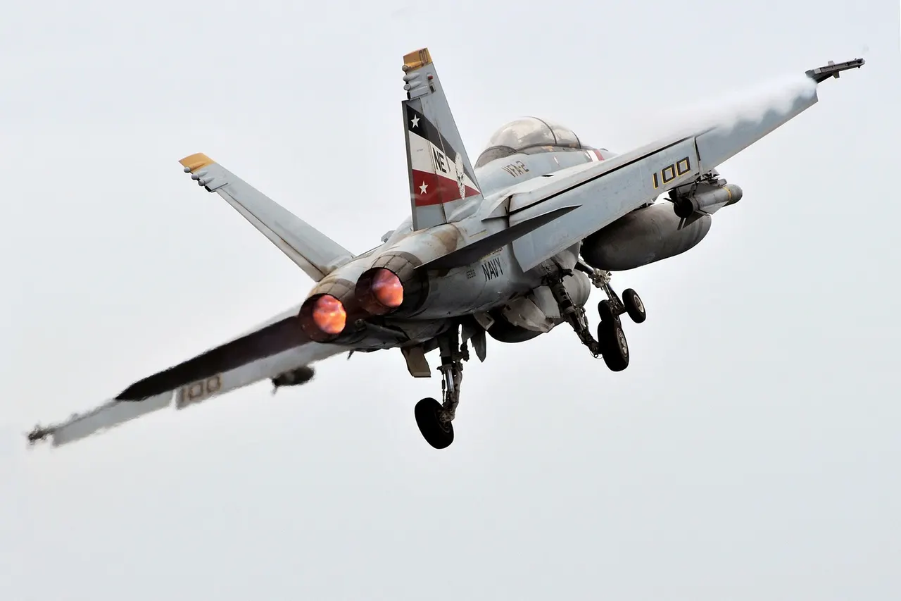NORTH ARABIAN SEA (July 10, 2008) An F/A-18F Super Hornet assigned to the "Bounty Hunters" of Strike Fighter Squadron (VFA) 2 climbs away from the Nimitz-class aircraft carrier USS Abraham Lincoln (CVN-72) after being launched from one of the ship's four steam-powered catapults. Lincoln is deployed to the U.S. 5th Fleet area of responsibility to support Operations Iraqi Freedom and Enduring Freedom as well as maritime security operations.