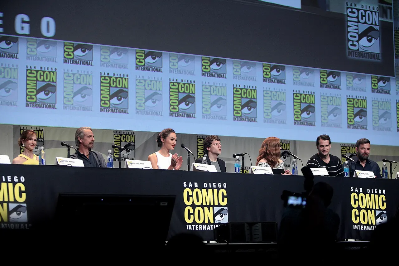 Holly Hunter, Jeremy Irons, Gal Gadot, Jesse Eisenberg, Amy Adams, Henry Cavill and Ben Affleck speaking at the 2015 San Diego Comic Con International, for "Batman v Superman: Dawn of Justice", at the San Diego Convention Center in San Diego, California. Please attribute to Gage Skidmore if used elsewhere.