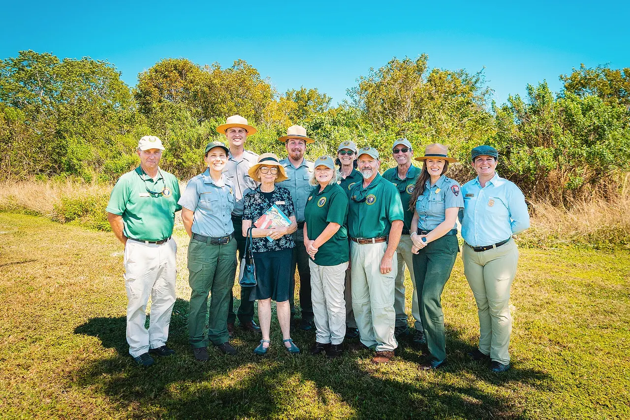 One of the best ways to explore the park is on a program! Pick an area and check out the types of programs you may be able to enjoy! You can also search the dates of your planned visit on the calendar for an overview of the activities that will be offered throughout the park! Get this information on our website: www.nps.gov/ever/planyourvisit/things2do.htm Image: A group of Park Rangers and volunteers stand in a group posing in front of vegetation on a bright blue day. NPS Photo by Anthony Sleiman